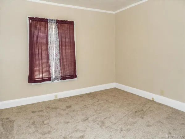 an empty room with window