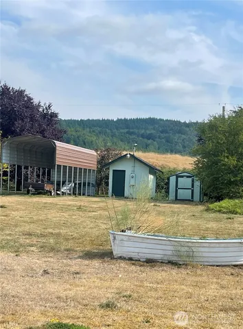 a view of outdoor space and a mountain view
