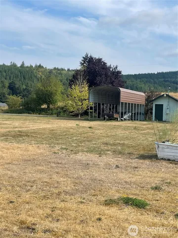 a view of a balcony with an outdoor space