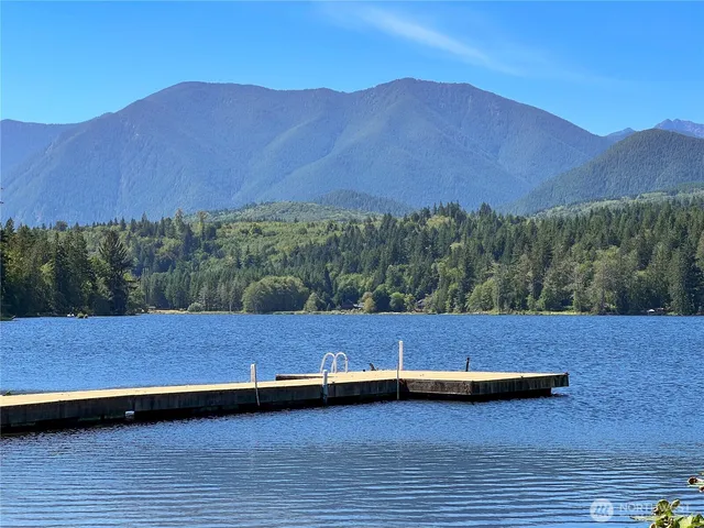 a view of a lake with a mountain in the background