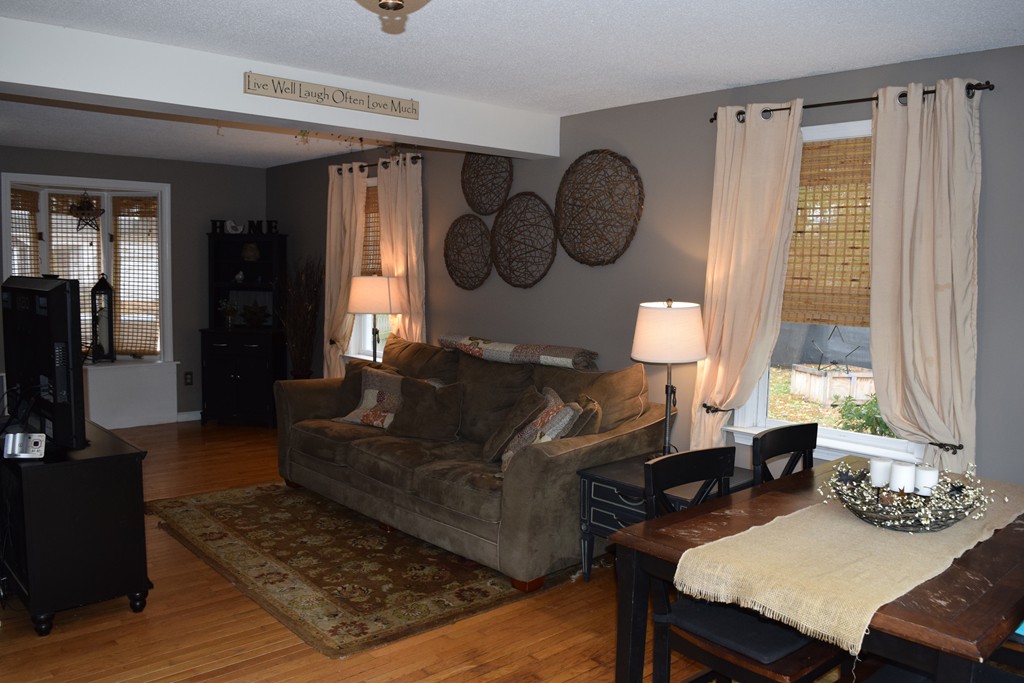 54 Luden Street Springfield, MA 01118 - Photo 8 of 24 a living room with furniture and a window