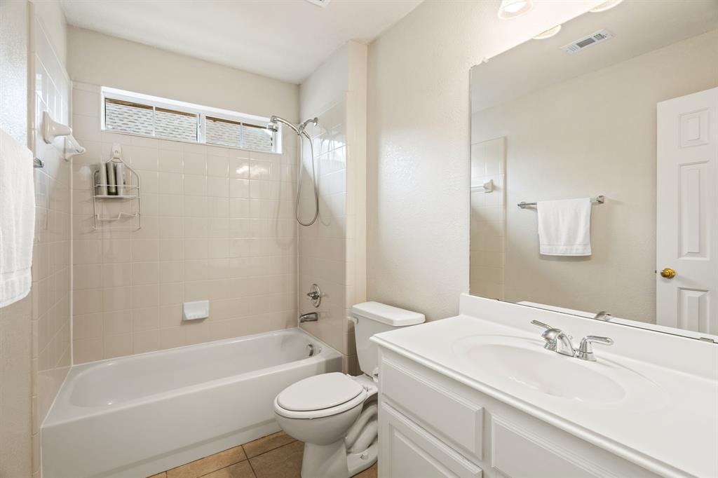 2012 Burnside Drive Allen, TX 75013 - Photo 36 of 40 a bathroom with a sink toilet and shower