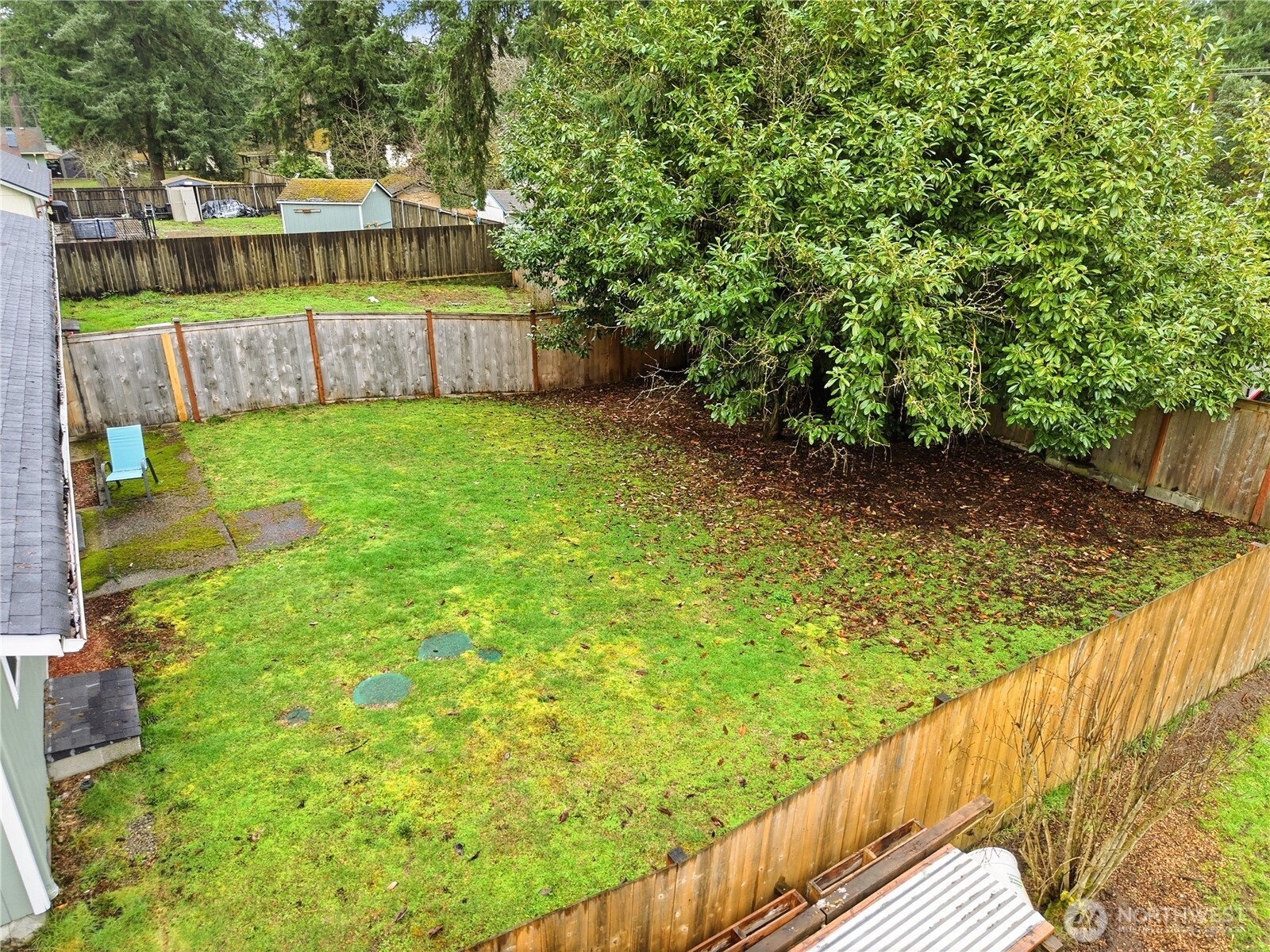 7438 Mullen Road Southeast, Unit AB Lacey, WA 98503 - Photo 27 of 37 a view of a backyard with a small cabin