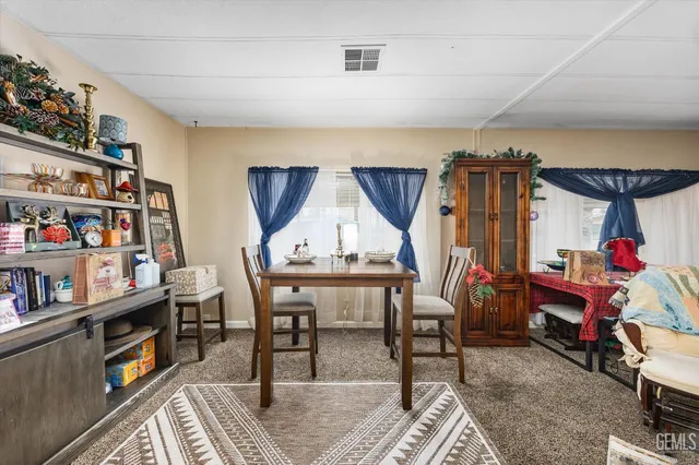 a view of a workspace with furniture