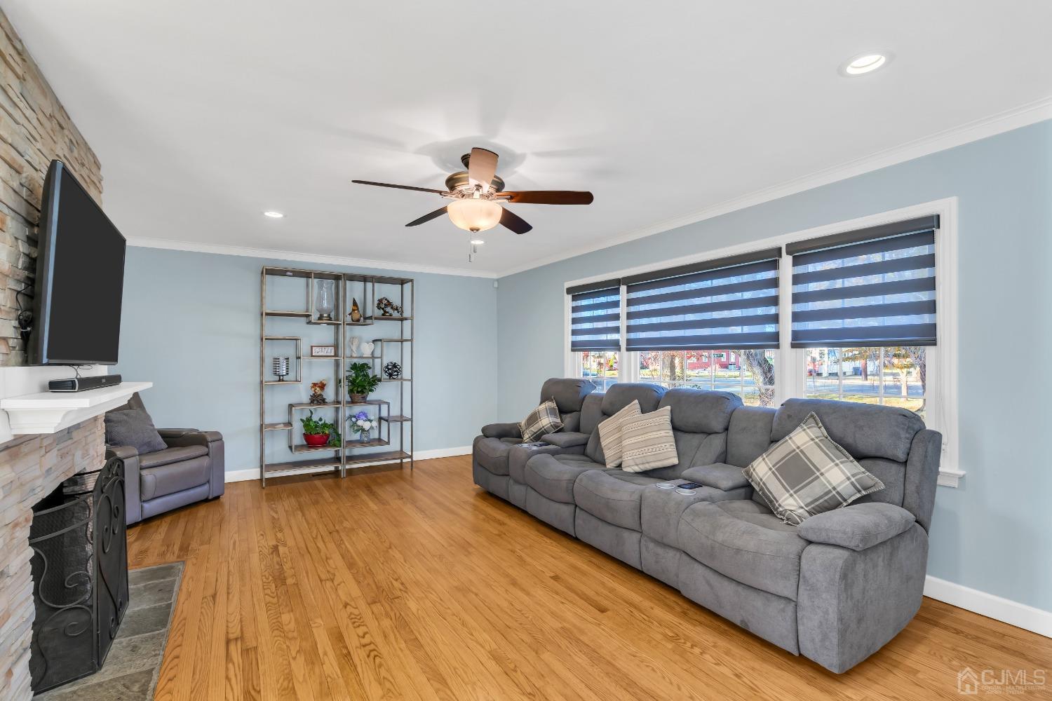 116 Grovers Mill Road Plainsboro, NJ 08536 - Photo 17 of 78 a living room with furniture and a flat screen tv