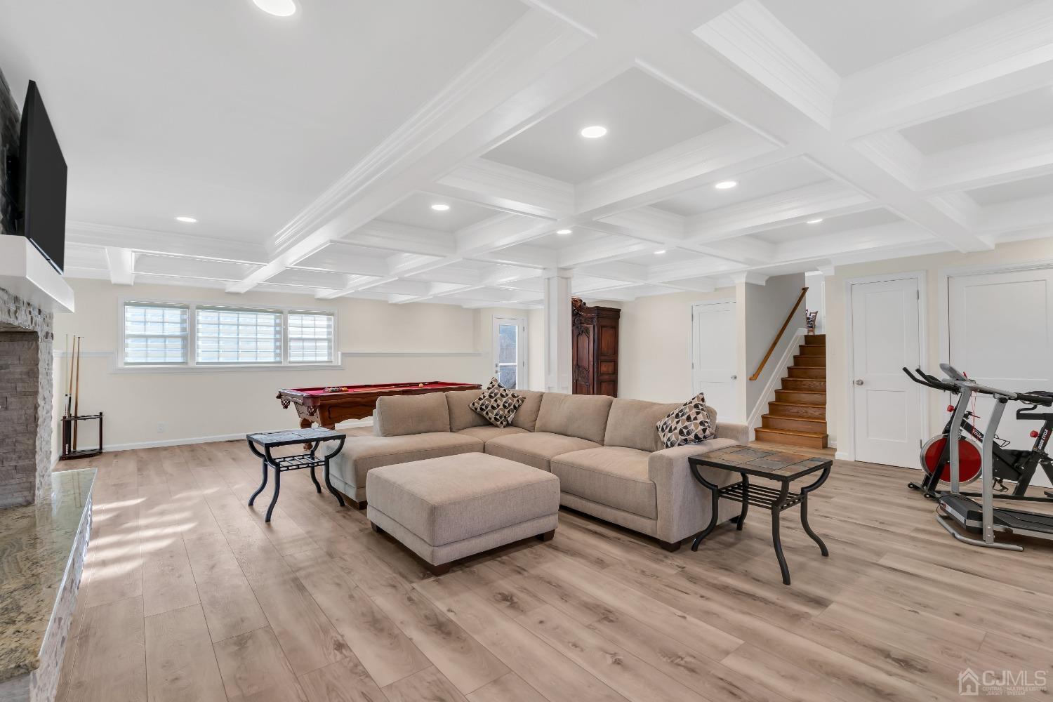 116 Grovers Mill Road Plainsboro, NJ 08536 - Photo 23 of 78 a living room with furniture and a wooden floor