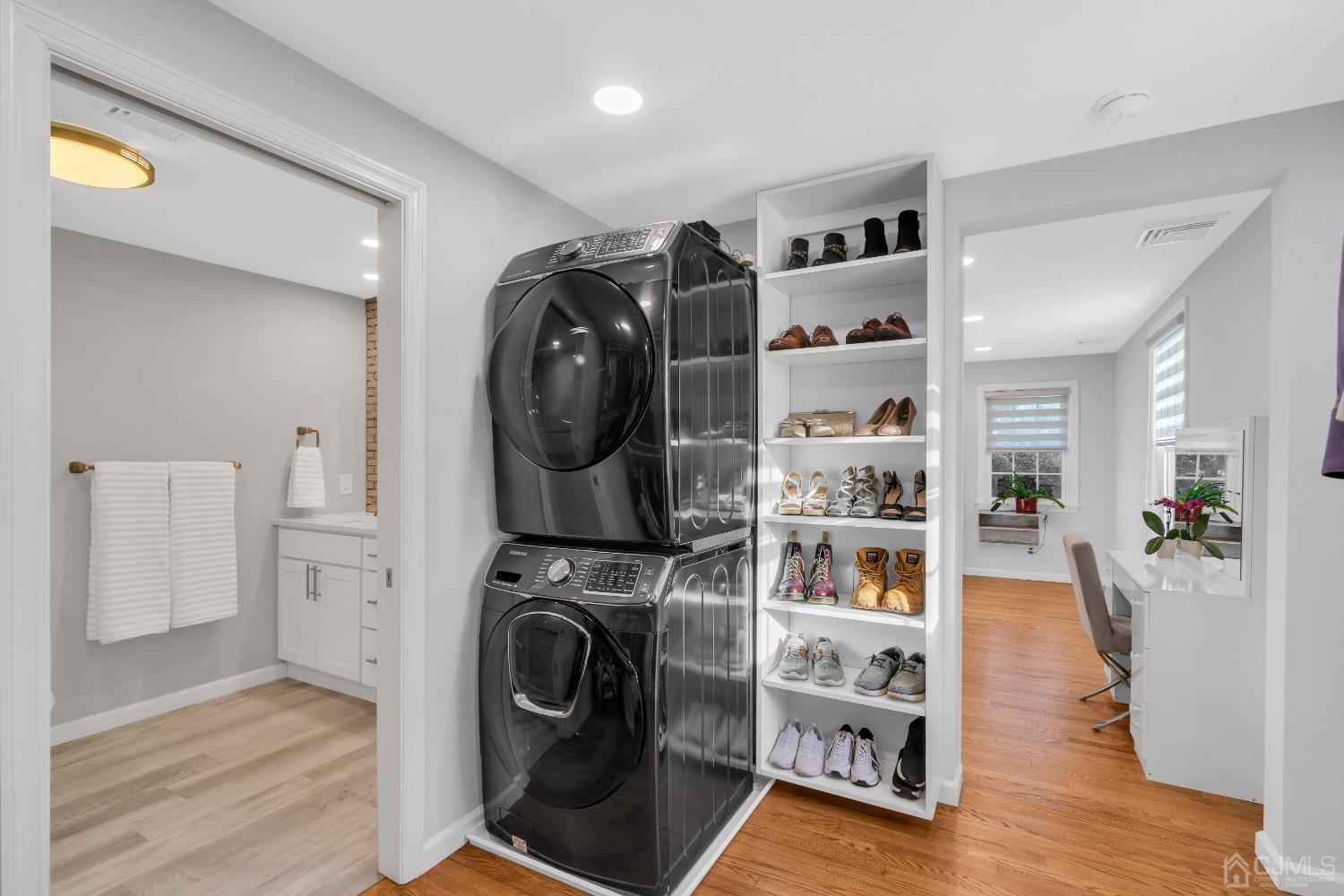 116 Grovers Mill Road Plainsboro, NJ 08536 - Photo 35 of 78 a view of walk in closet with clothes and shoes