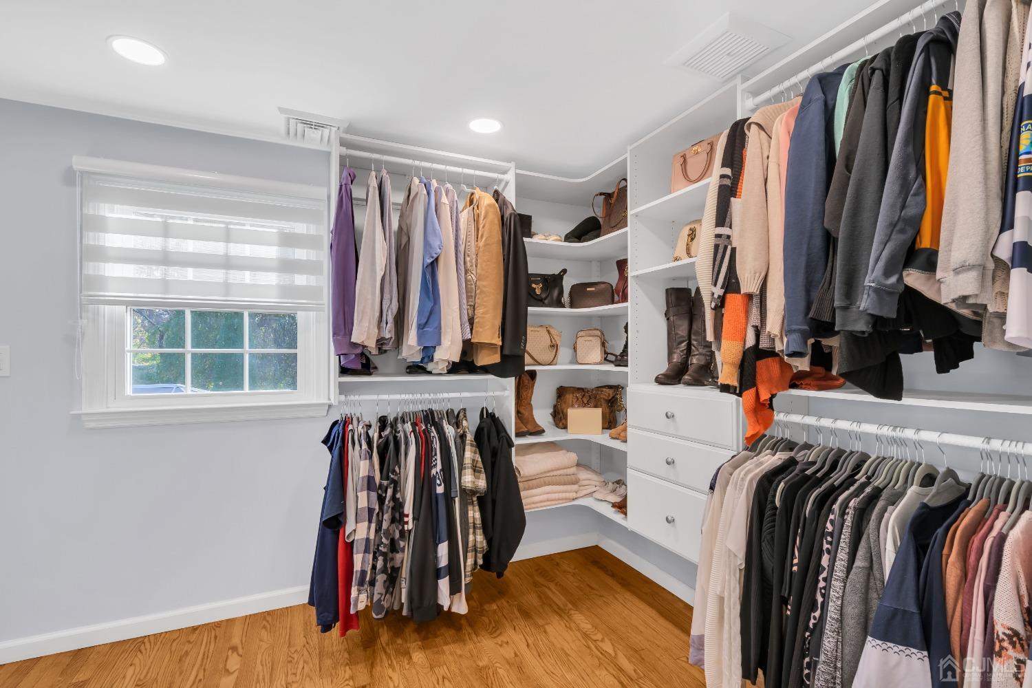 116 Grovers Mill Road Plainsboro, NJ 08536 - Photo 37 of 78 a view of walk in closet with clothes and shoes