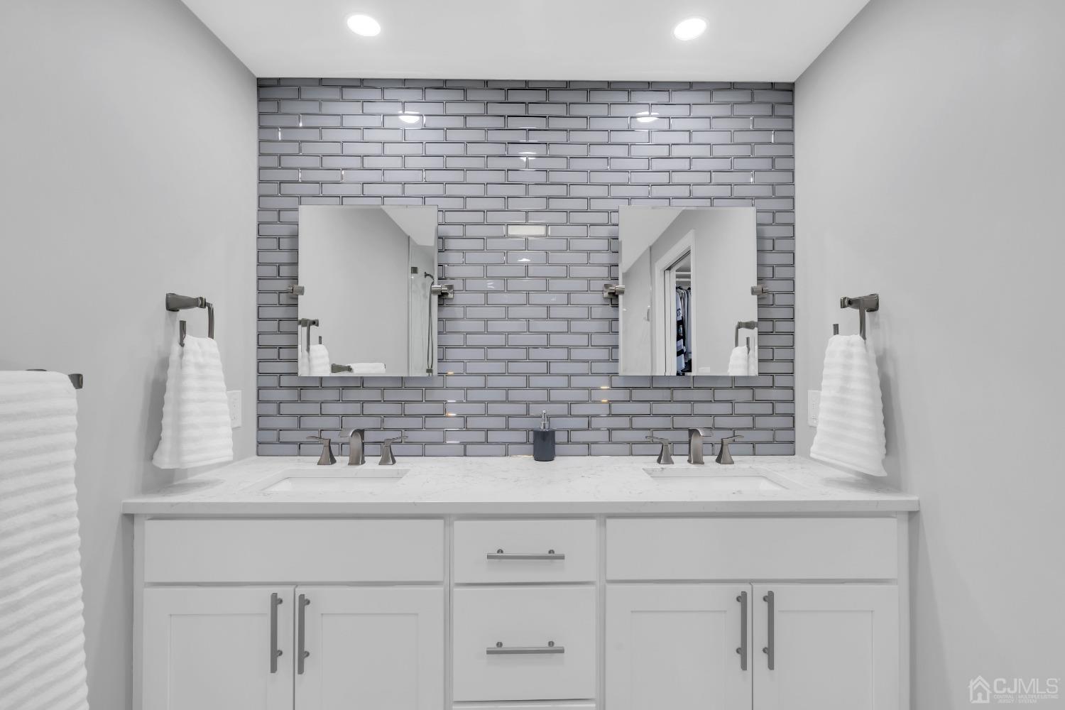 116 Grovers Mill Road Plainsboro, NJ 08536 - Photo 40 of 78 a bathroom with a sink and a mirror