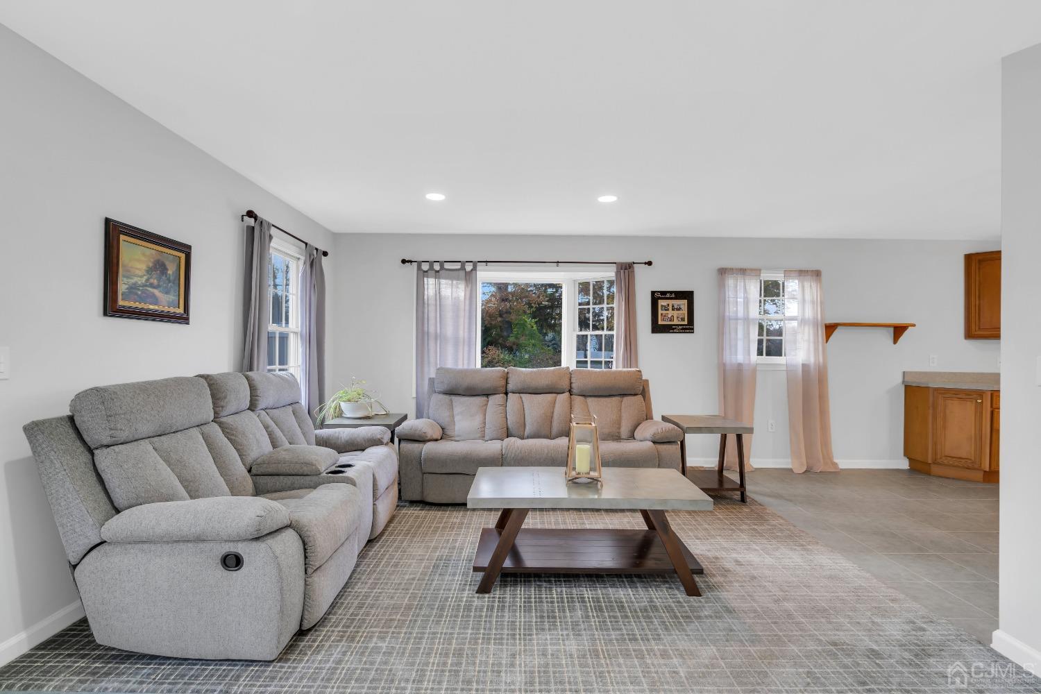 116 Grovers Mill Road Plainsboro, NJ 08536 - Photo 50 of 78 a living room with furniture and a large window