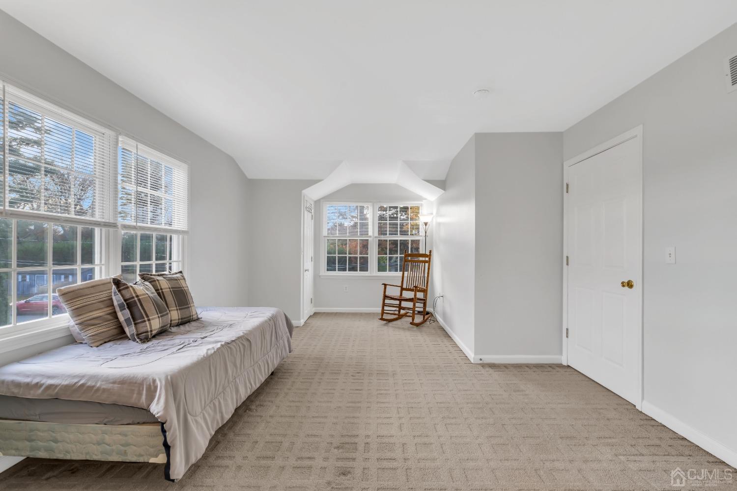 116 Grovers Mill Road Plainsboro, NJ 08536 - Photo 58 of 78 a bedroom with a bed and a large window