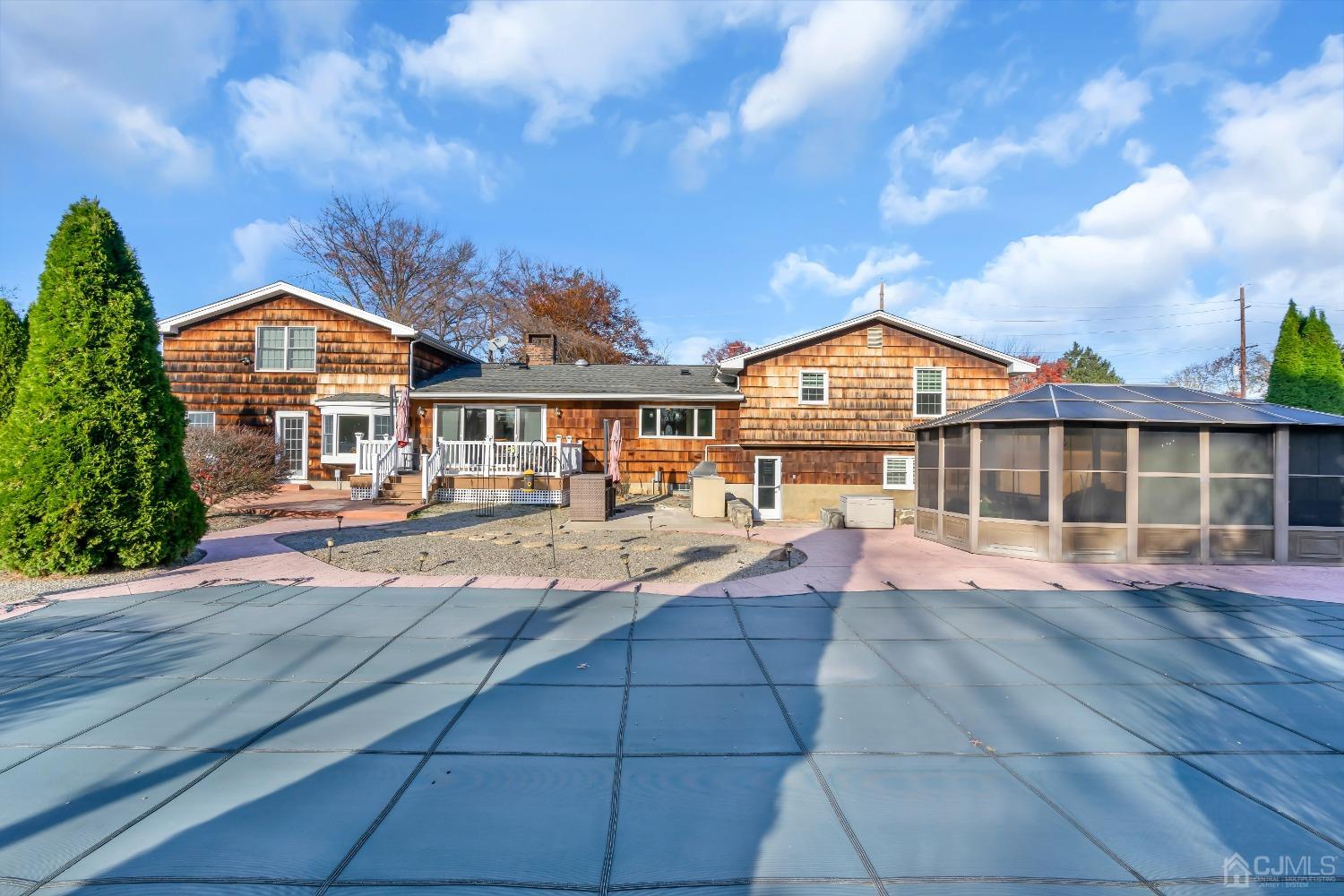 116 Grovers Mill Road Plainsboro, NJ 08536 - Photo 67 of 78 a view of a house with swimming pool and sitting space
