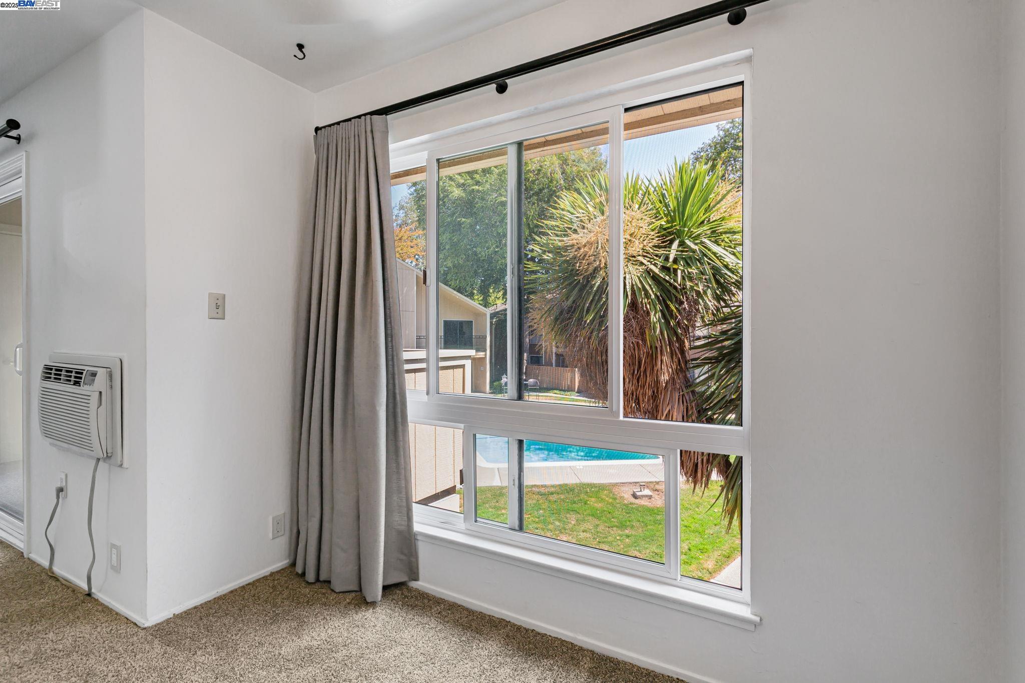 8975 Alcosta Boulevard, Unit 104 San Ramon, CA 94583 - Photo 15 of 42 a view of a room that has a large window