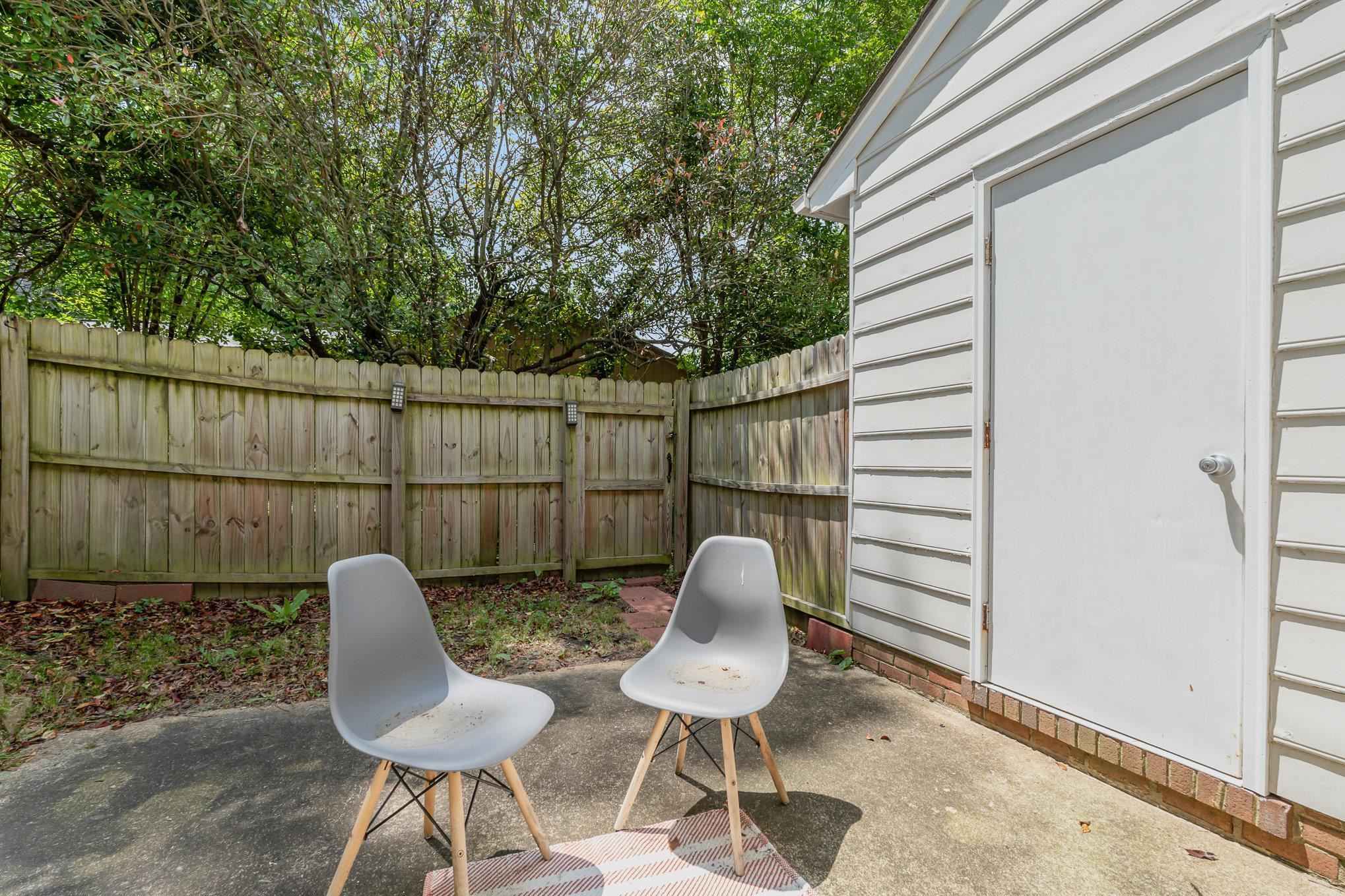 645 Springview Trail Garner, NC 27529 - Photo 3 of 3 a view of a chairs in backyard of the house