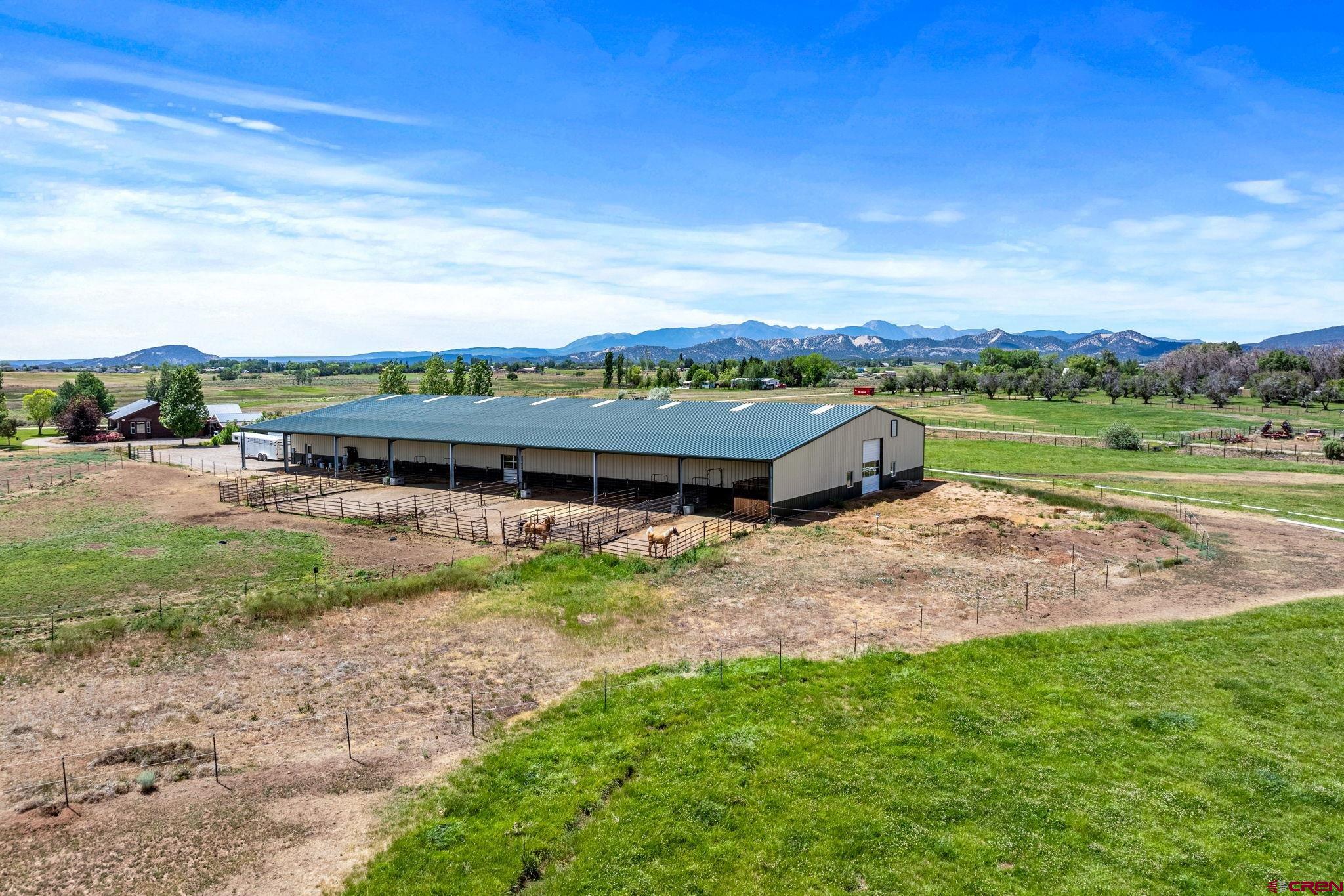616 Cole Ranch Road Durango, CO 81303 - Photo 16 of 43 a view of a garden with an outdoor seating
