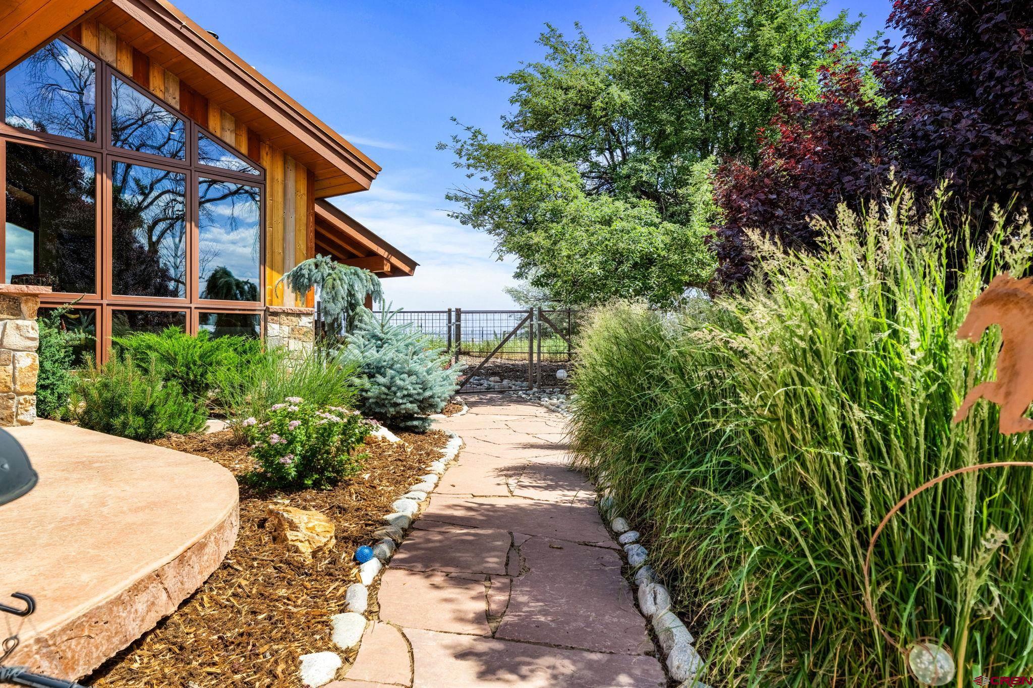 616 Cole Ranch Road Durango, CO 81303 - Photo 19 of 43 a view of a pathway with a house