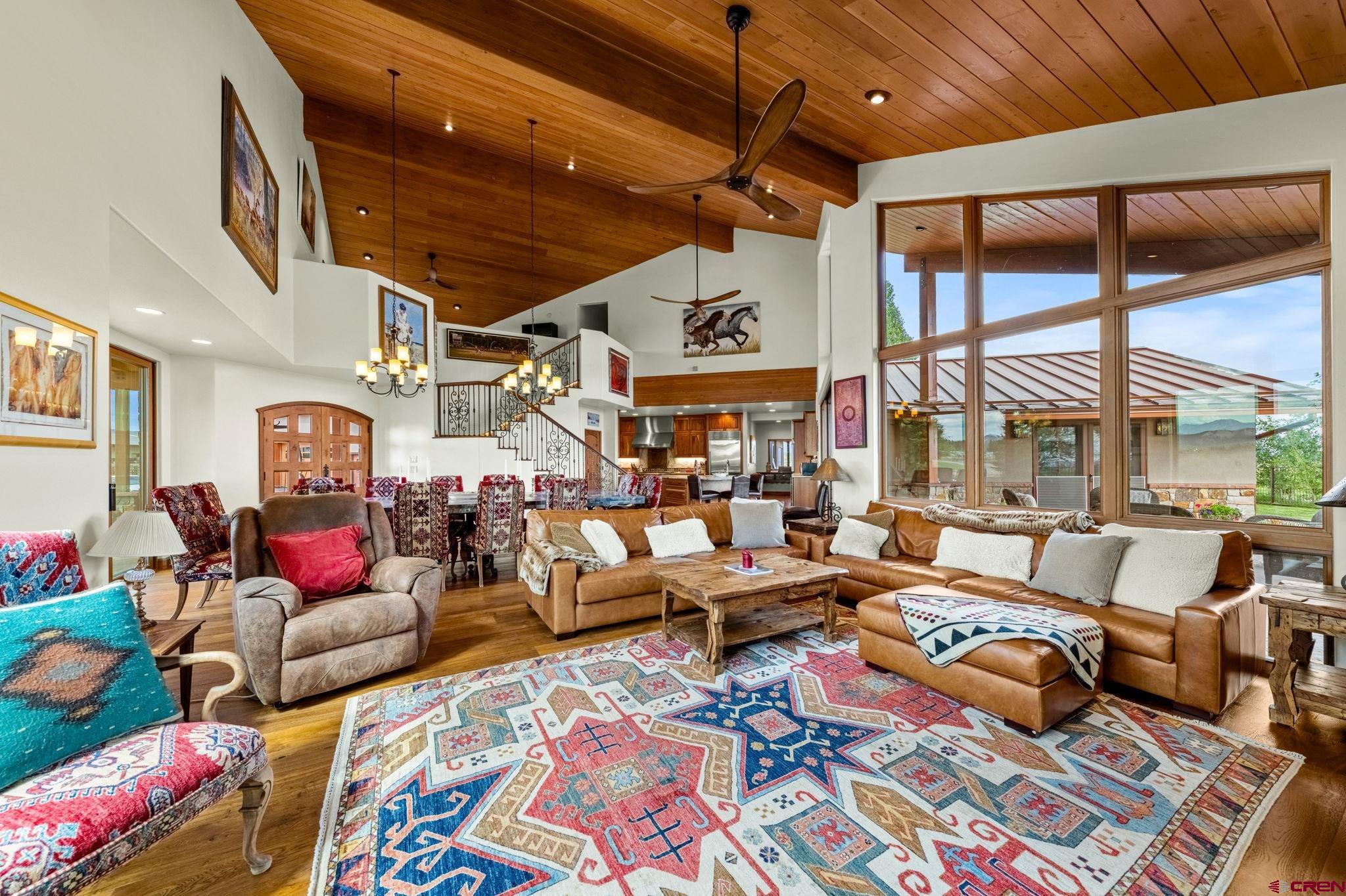 616 Cole Ranch Road Durango, CO 81303 - Photo 22 of 43 a living room with lots of furniture and a rug