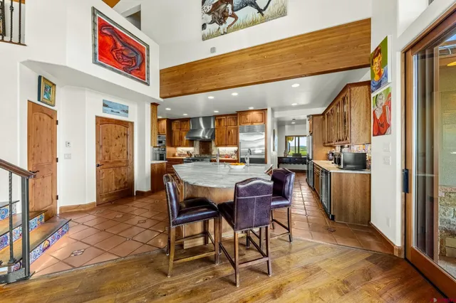 a kitchen that has a lot of cabinets in it