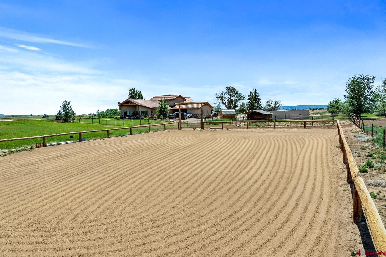 616 Cole Ranch Road Durango, CO 81303 - Photo 38 of 43 a view of a house with a yard