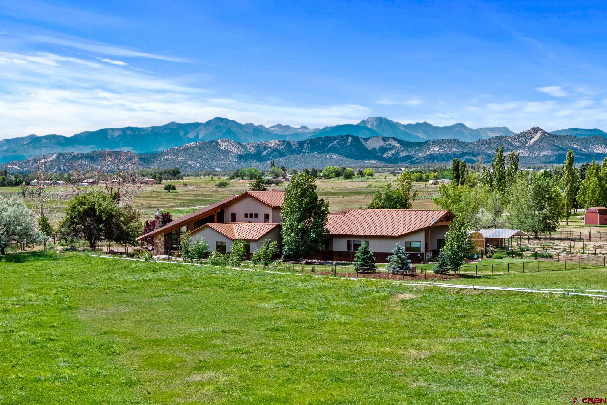 616 Cole Ranch Road Durango, CO 81303 - Photo 4 of 43 a view of a town with mountains in the background