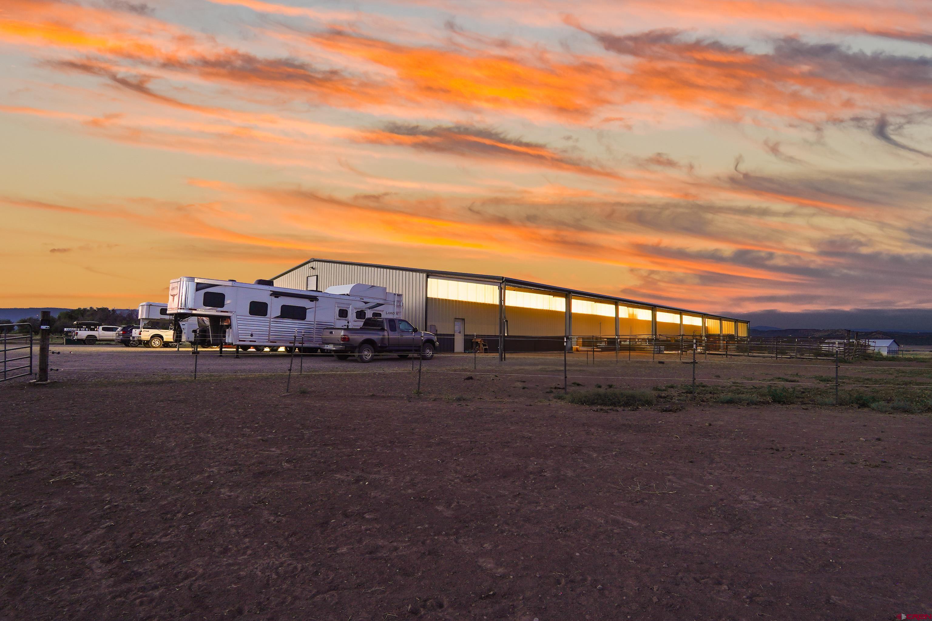 616 Cole Ranch Road Durango, CO 81303 - Photo 5 of 43 a view of a big house with a big yard
