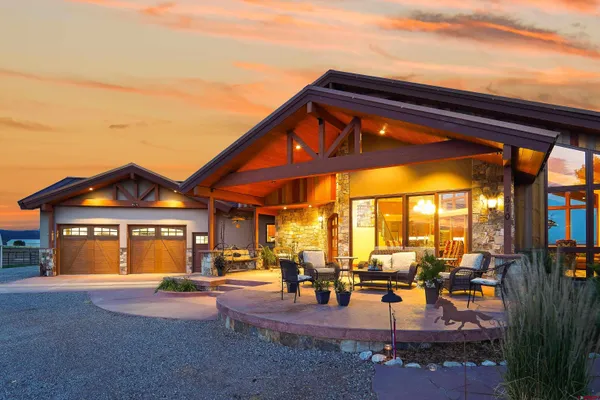 a front view of a house with a patio