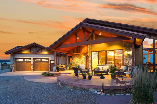 a front view of a house with a patio