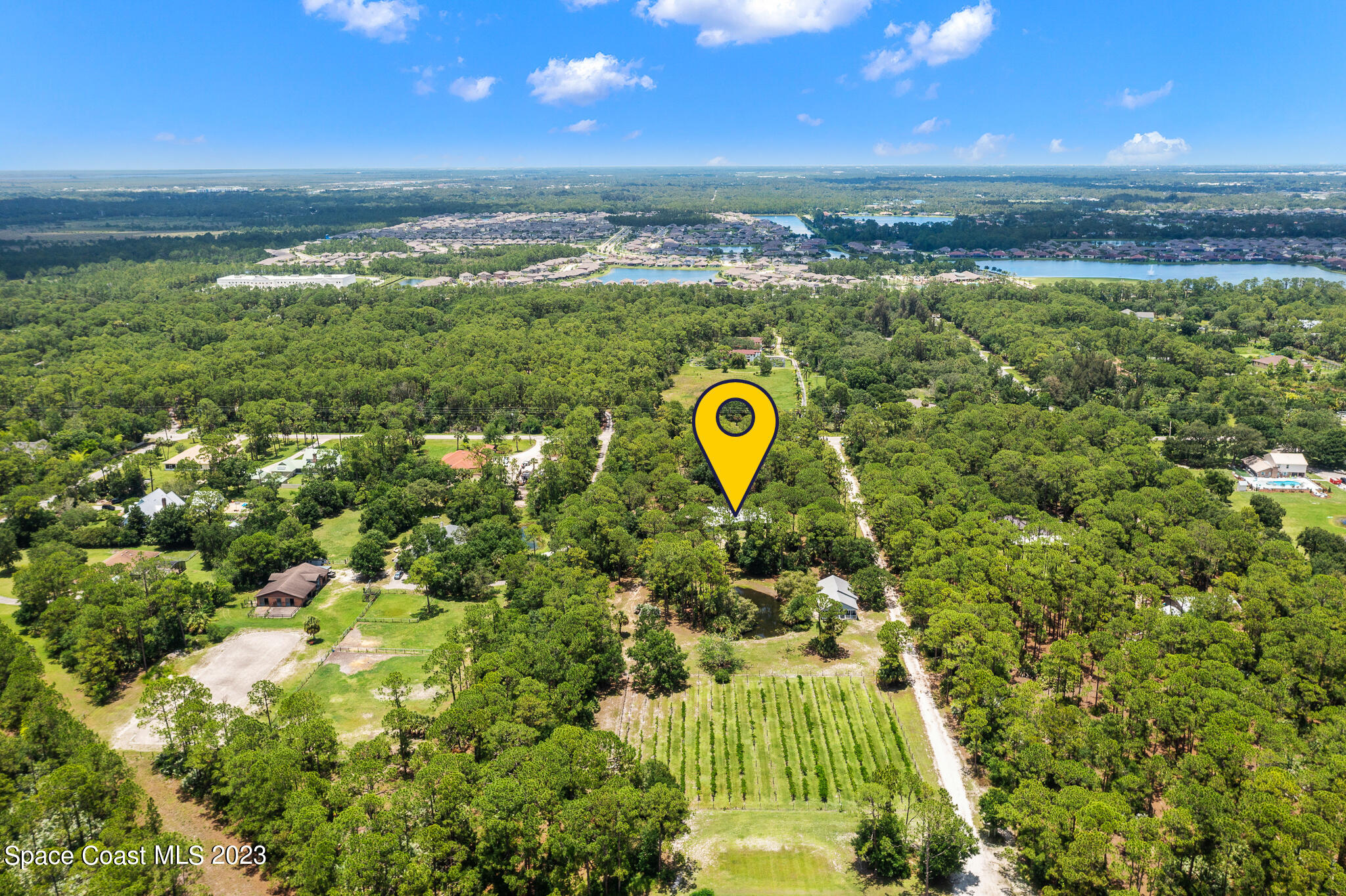 3836 Hield Road Northwest Palm Bay, FL 32907 - Photo 2 of 55 a view of a city