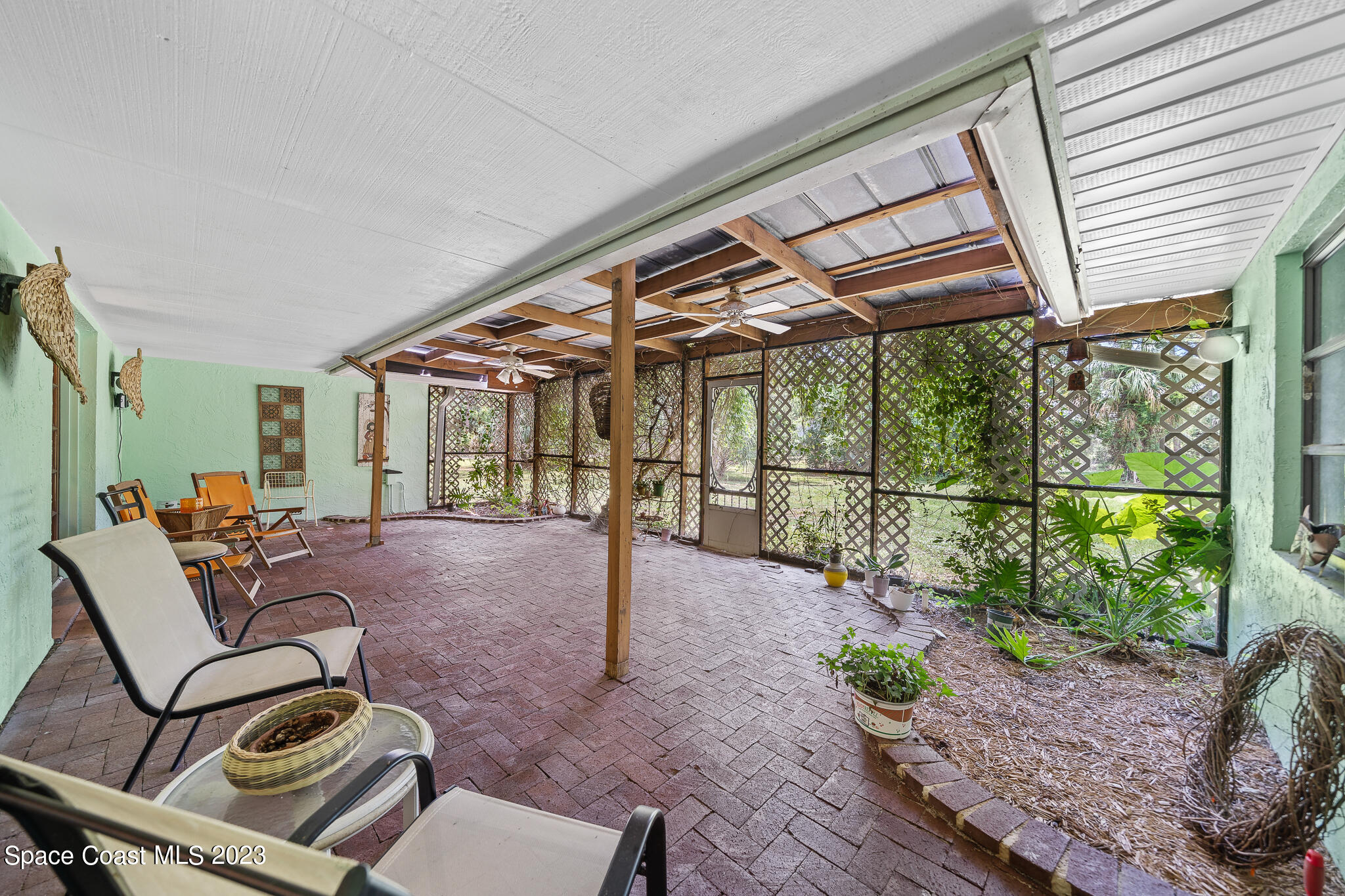 3836 Hield Road Northwest Palm Bay, FL 32907 - Photo 32 of 55 Huge Covered Patio