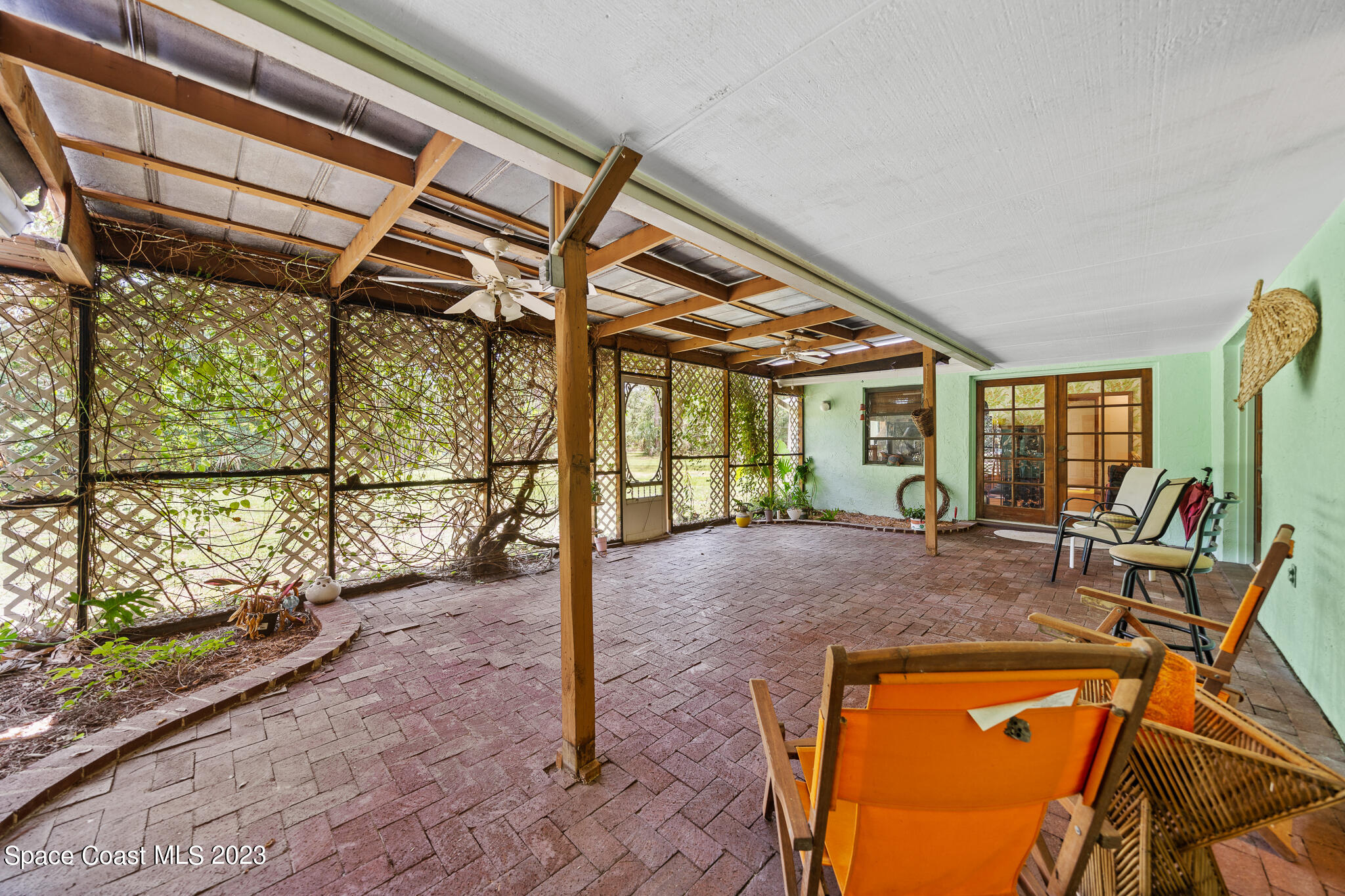 3836 Hield Road Northwest Palm Bay, FL 32907 - Photo 33 of 55 Huge Covered Patio