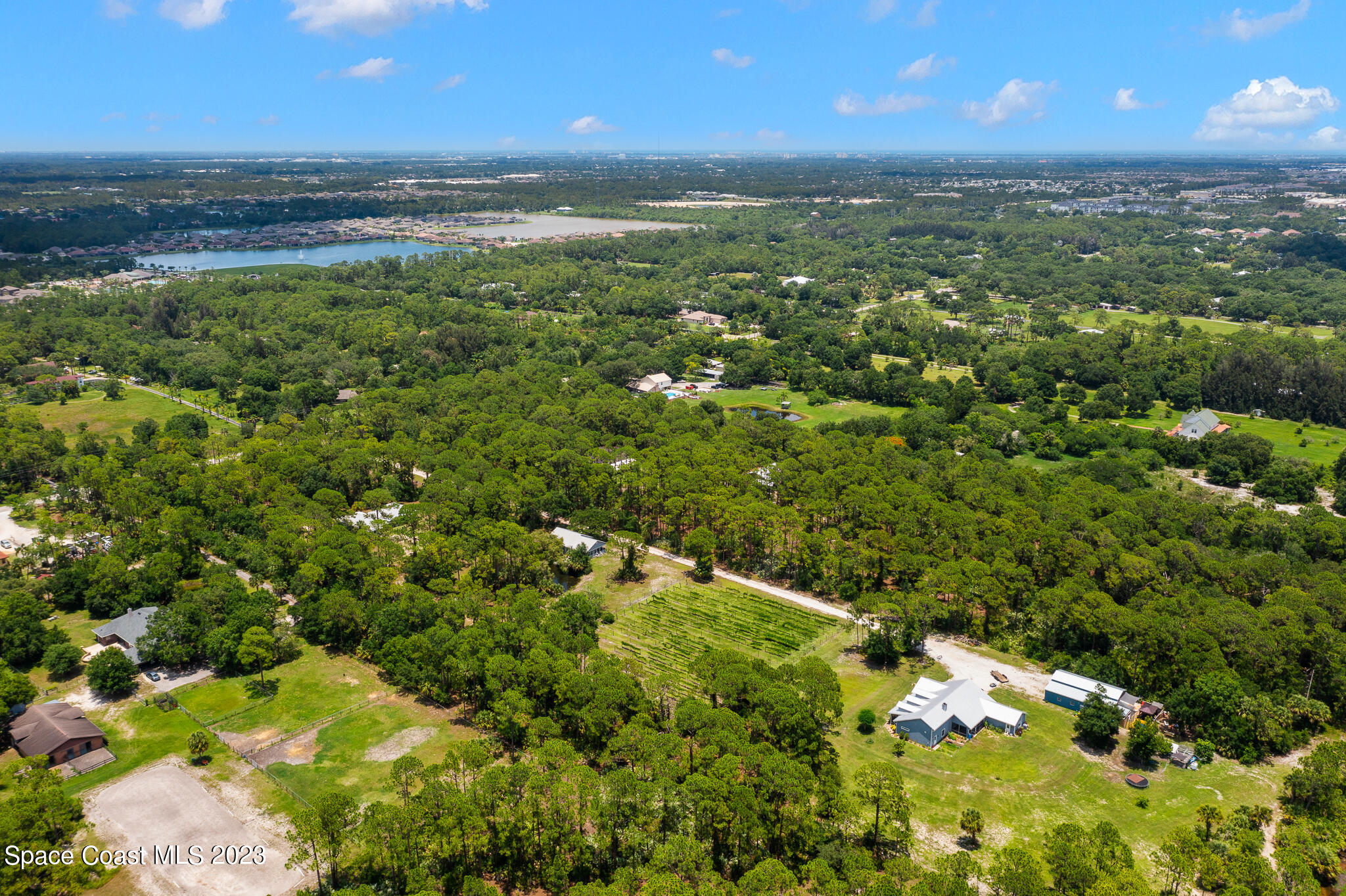3836 Hield Road Northwest Palm Bay, FL 32907 - Photo 50 of 55 a view of an outdoor space and a lake view