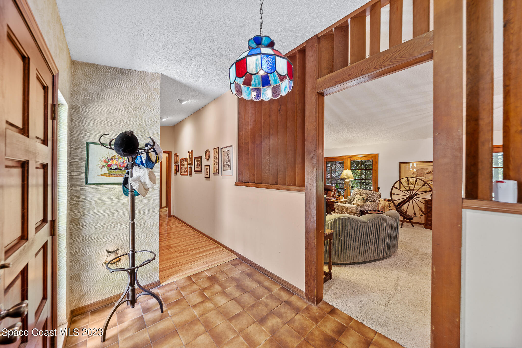 3836 Hield Road Northwest Palm Bay, FL 32907 - Photo 6 of 55 Foyer into Hallway/Living Area