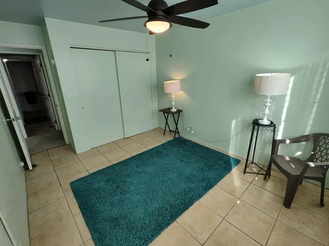 a view of a porch with furniture