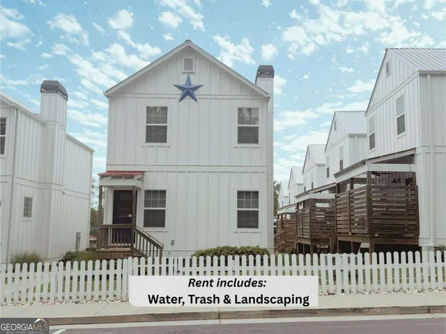a view of a house with a white door