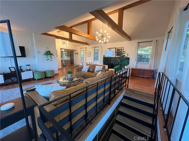 a view of a living room and dining room