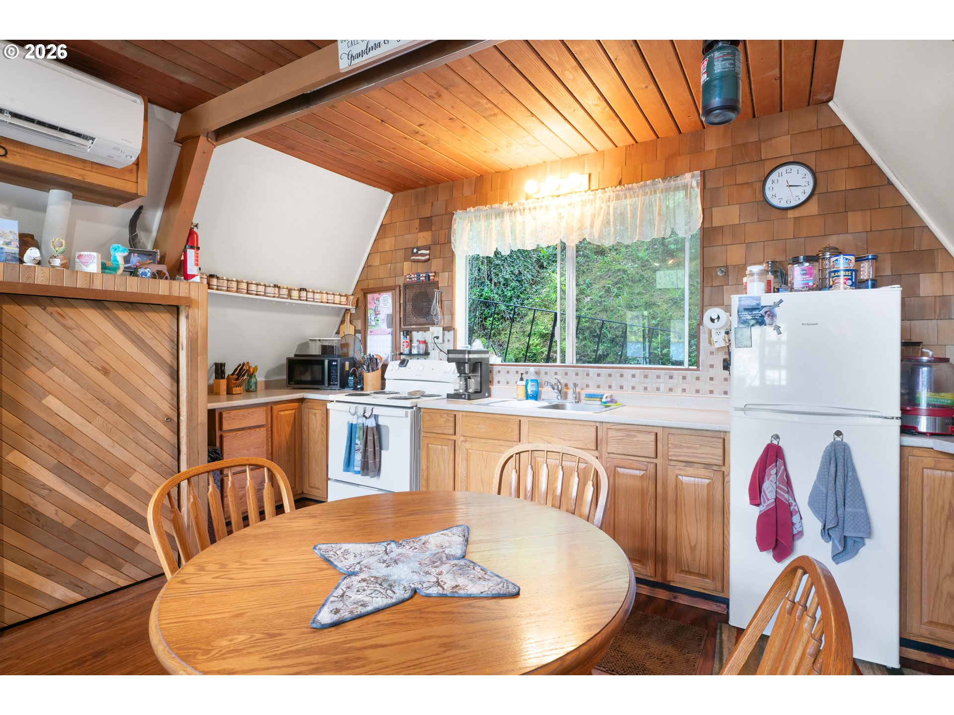 1901 Loon Lake Road Reedsport, OR 97467 - Photo 13 of 24 a dining room with a table and chairs