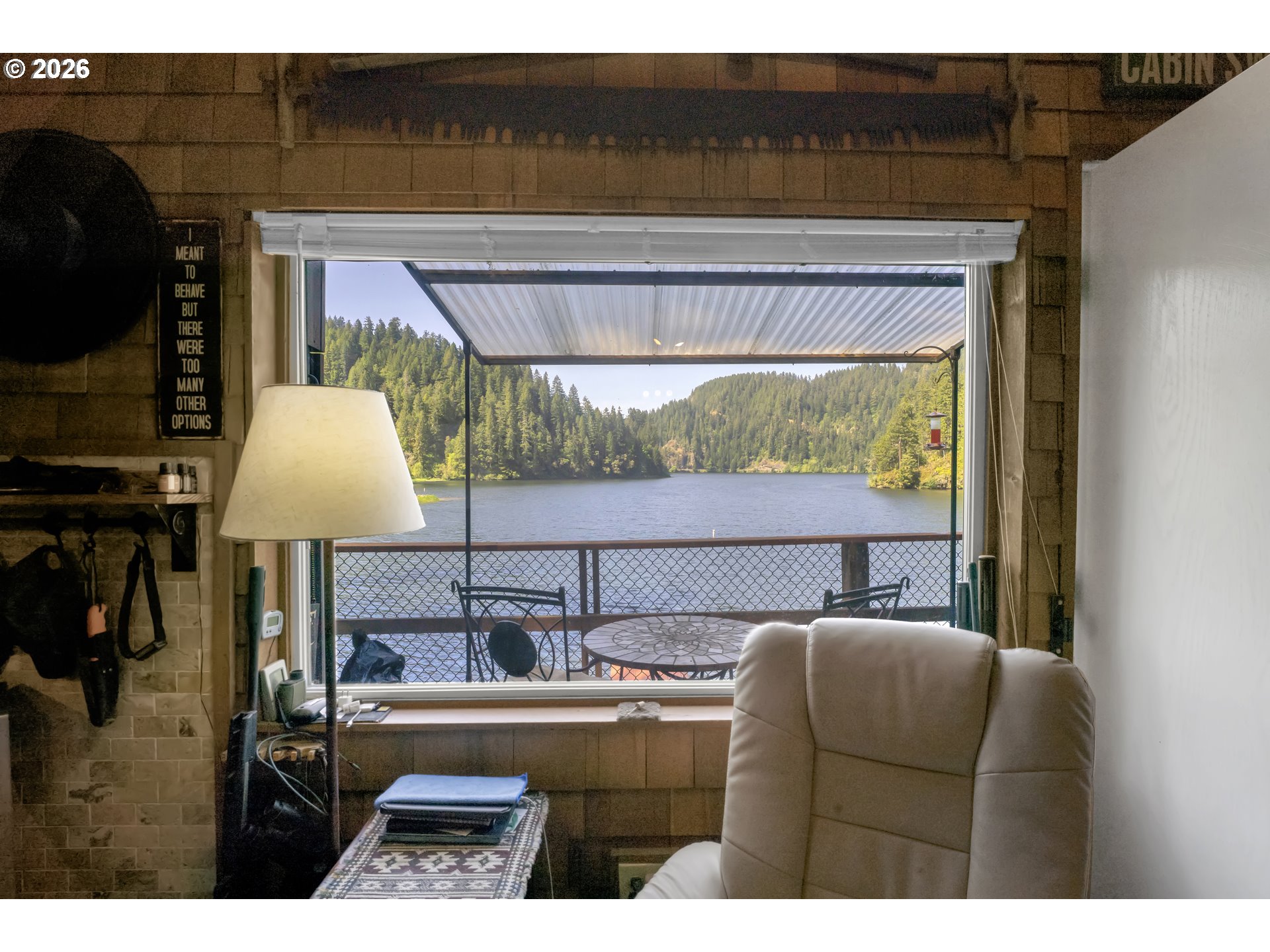 1901 Loon Lake Road Reedsport, OR 97467 - Photo 16 of 24 a balcony with table and chairs