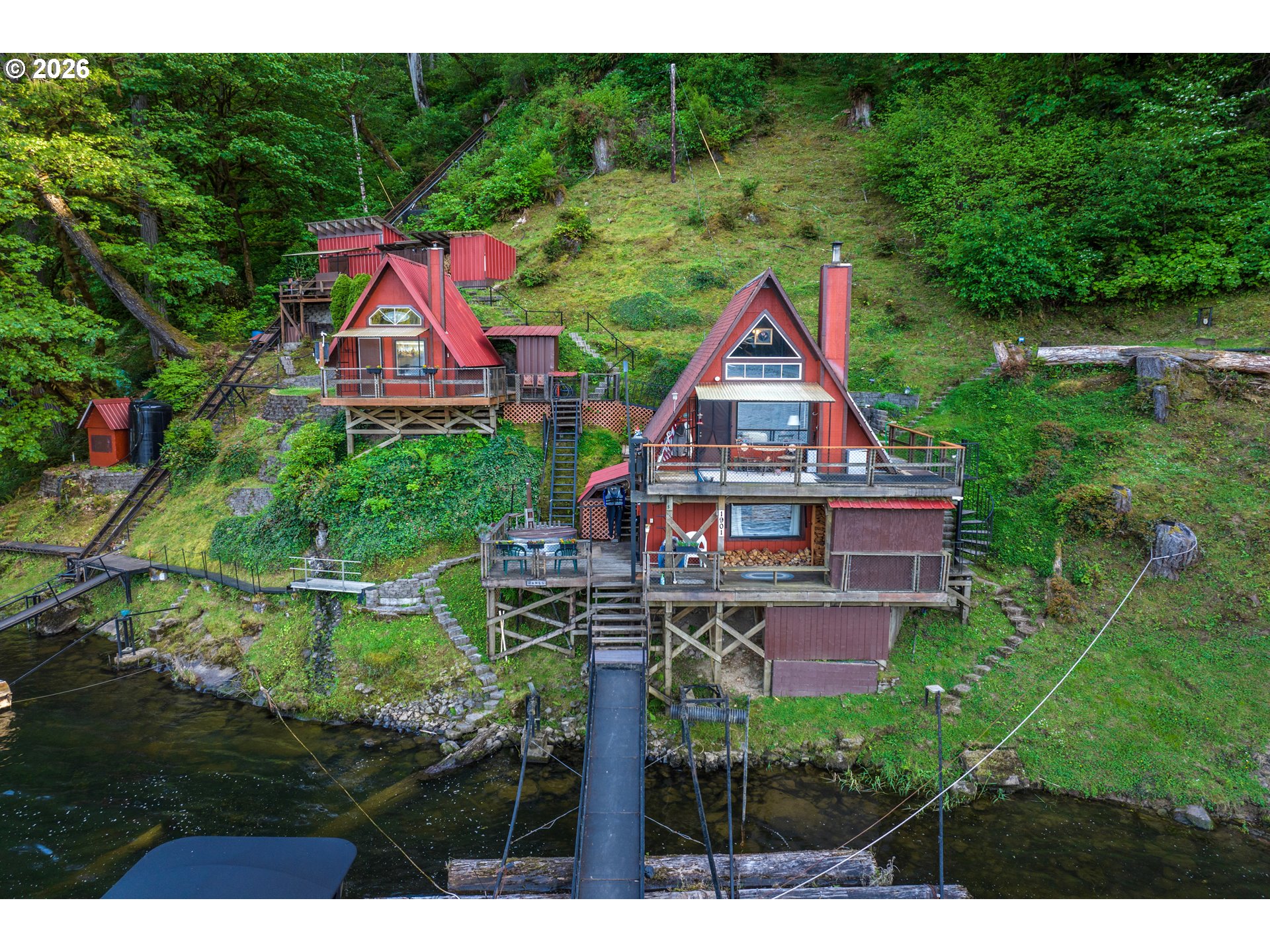 1901 Loon Lake Road Reedsport, OR 97467 - Photo 2 of 24 a aerial view of a house with swimming pool and garden