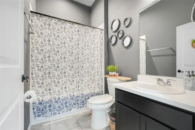 a bedroom with toys and a baby crib