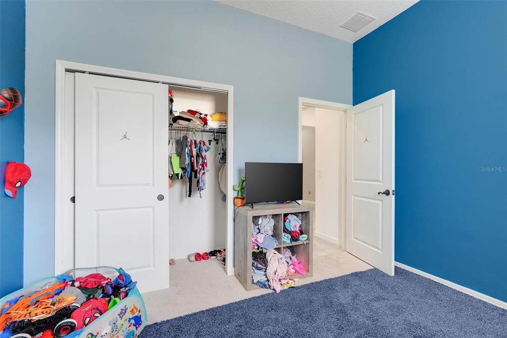 1807 Sunfish Street St. Cloud, FL 34771 - Photo 23 of 27 a view of a livingroom with workspace and toys