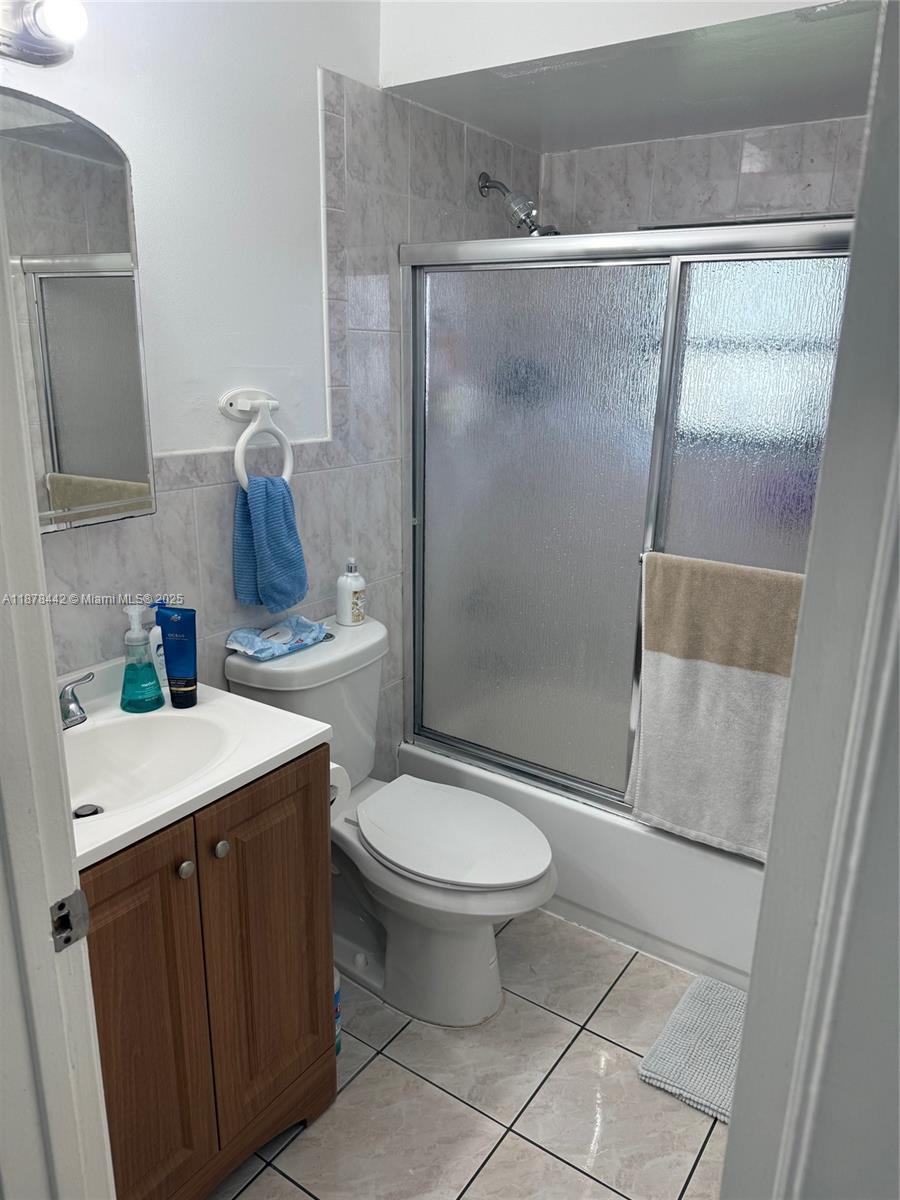 4929 Southwest 139th Court Miami, FL 33175 - Photo 11 of 27 a bathroom with a sink toilet and shower