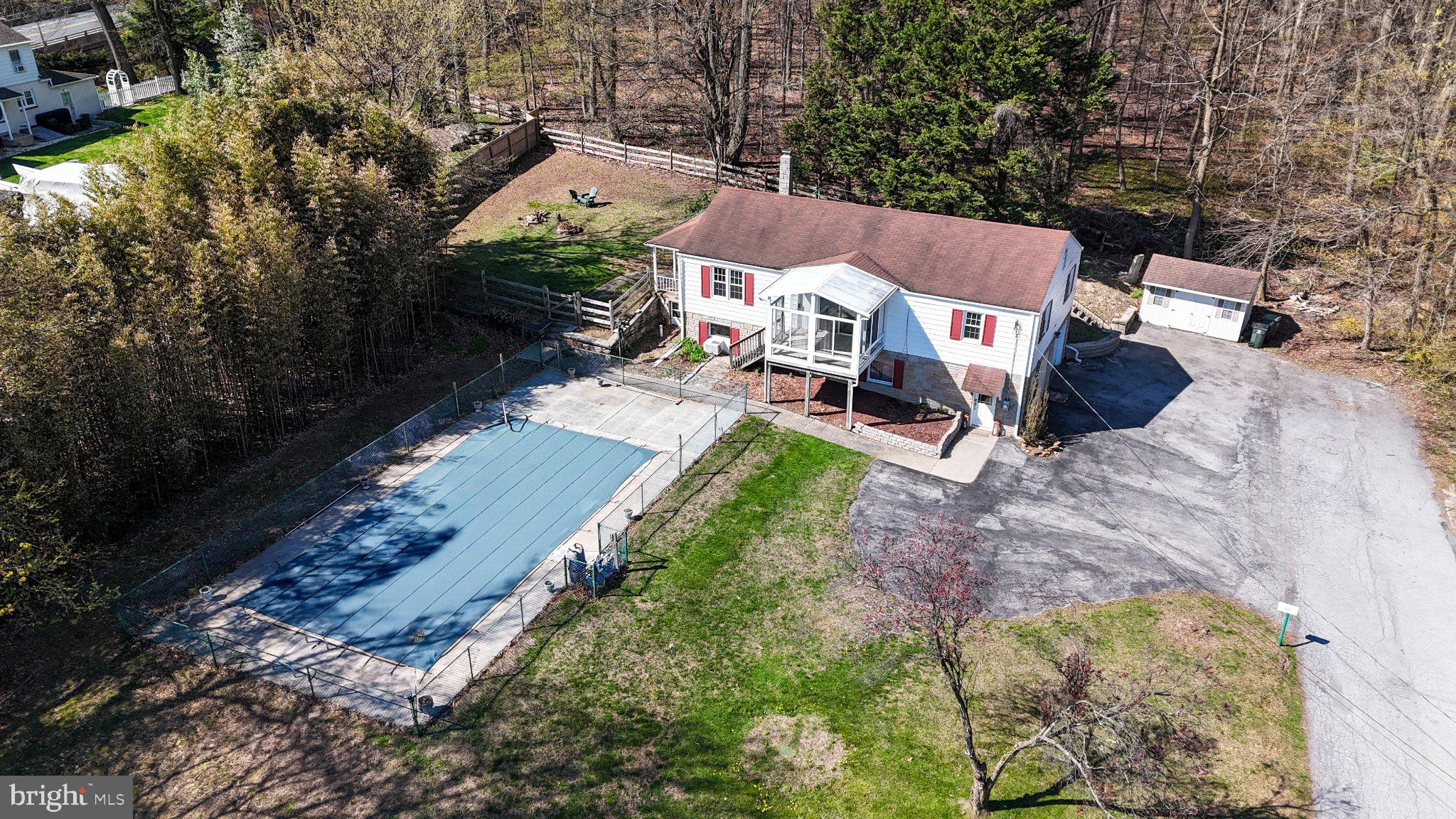 2512 Grandview Road Coatesville, PA 19320 - Photo 3 of 51 an aerial view of a house with a yard basket ball court and outdoor seating