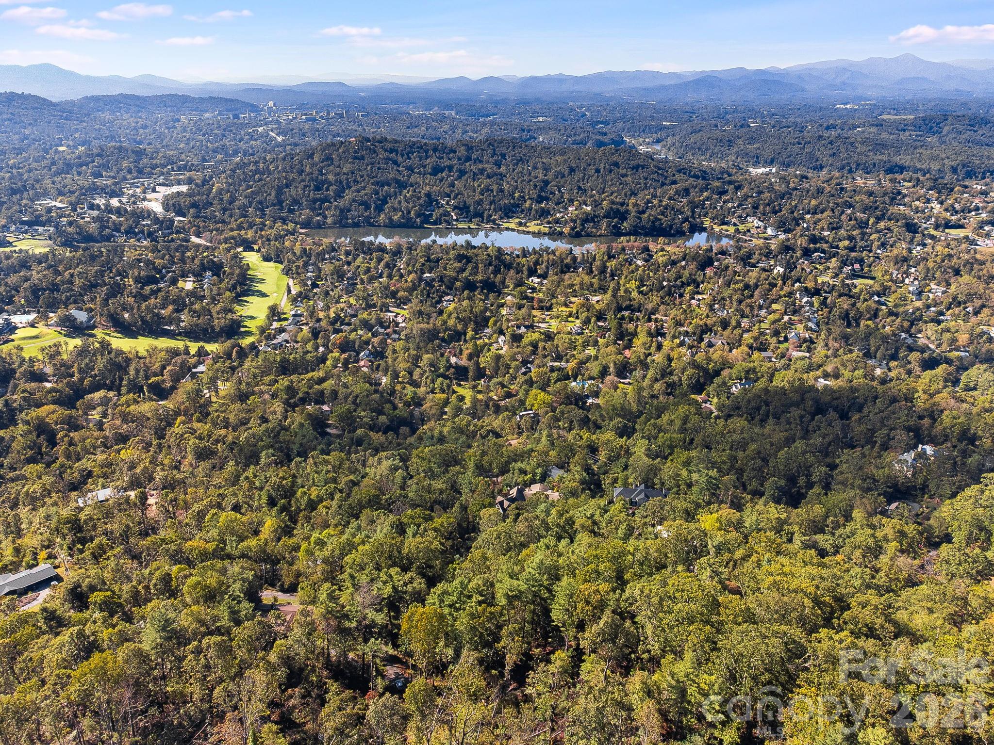 99999 Beaverbrook Road, Unit 2 Asheville, NC 28804 - Photo 18 of 33 a view of city and mountain