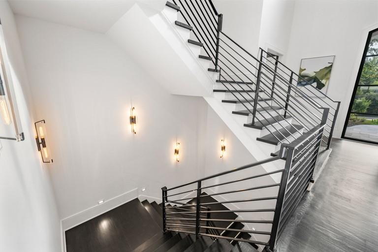 5211 Powers Ferry Road Northwest Sandy Springs, GA 30327 - Photo 43 of 106 a view of entryway and hall with wooden floor