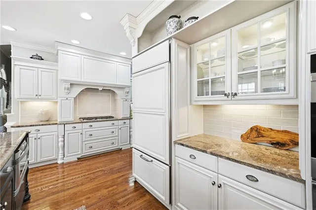 a view of a balcony with wooden floor and outdoor space