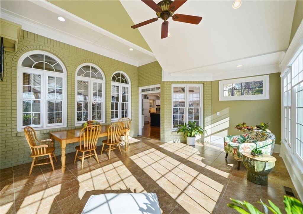 2855 Strathmore Drive Cumming, GA 30041 - Photo 29 of 96 a view of a dining room with furniture window and outside view