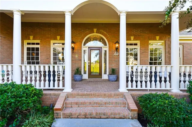 a view of a house with a porch