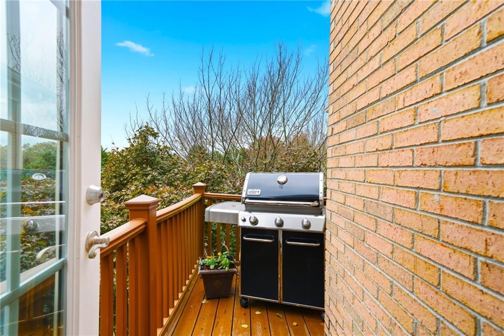 2855 Strathmore Drive Cumming, GA 30041 - Photo 31 of 96 a view of a balcony with wooden floor and outdoor space