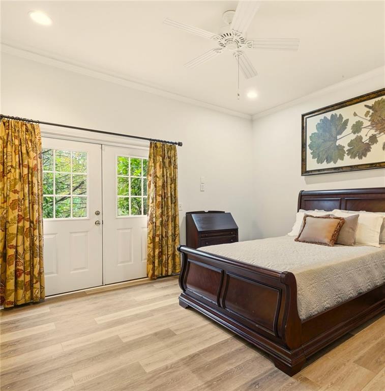 2855 Strathmore Drive Cumming, GA 30041 - Photo 64 of 96 a bedroom with a large bed and a window