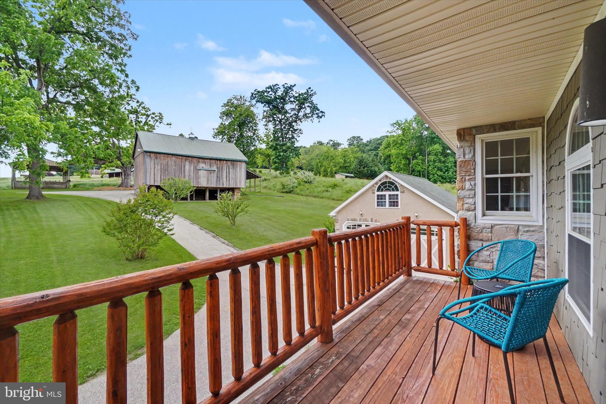 4941 Walters Hatchery Road Spring Grove, PA 17362 - Photo 38 of 71 a view of a two chairs in the deck next to a yard